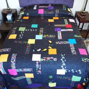 Black with shots of color queen quilt