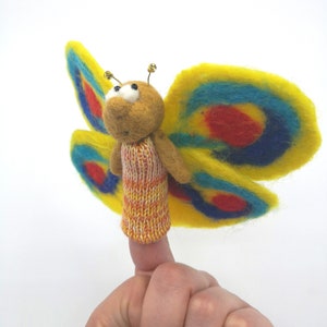 Papillon wool finger puppet.