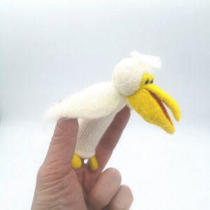 Pelican finger puppet in felted wool
