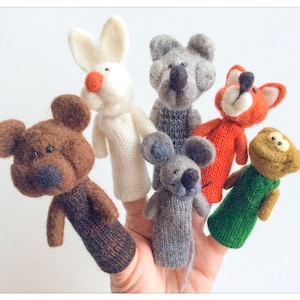 May include: Set of six finger puppets made of felt, including a brown bear, a white rabbit, a grey mouse, a grey bear, a red fox, and a green frog.