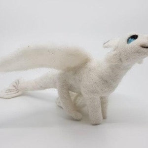 White Dragon finger puppet.
