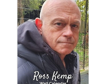 May include: A wall calendar featuring a photo of Ross Kemp, a British actor known for his roles in television dramas. The calendar has the text "Ross Kemp Wall Calendar" printed below the photo.