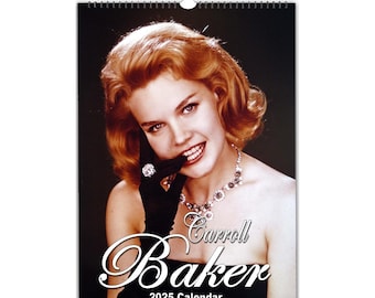 May include: A 2025 calendar featuring a black and white photo of Carroll Baker, a famous actress. The photo shows her smiling and wearing a black strapless dress, a diamond ring, and a pearl necklace. The calendar title is "Carroll Baker 2025 Calendar".
