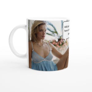 May include: A white coffee mug with a picture of a woman in a blue and white lingerie top. The text "Add your text here in the bubble" is in a speech bubble.