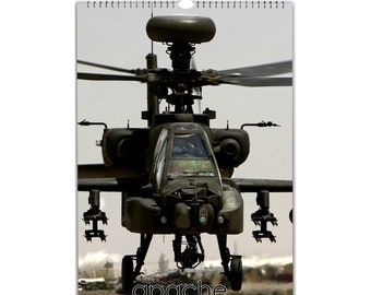 May include: A black Apache helicopter with a rotating blade, a large front window, and the text "apache 2025 Calendar" at the bottom.