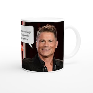May include: White ceramic coffee mug featuring a colour image of a man smiling. The mug has a speech bubble with the text "Put your message or the speech bubble here".