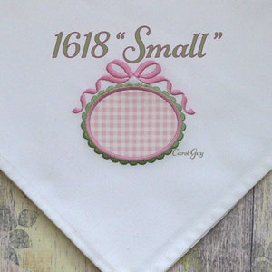 May include: White handkerchief with embroidered design. The design includes the text "1618 Small" in olive green, a pink bow, and a pink and green oval frame with a pink gingham pattern. The name "Carol Guy" is also embroidered.