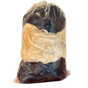 May include: A plastic bag containing two bundles of hair extensions. One bundle is black and the other is blonde.