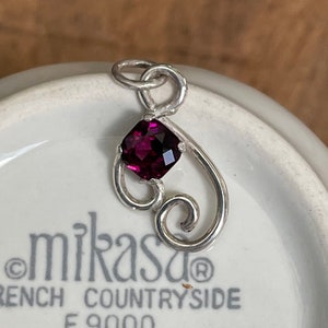 Purple garnet pendant