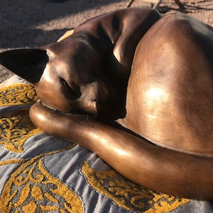 Curled up Cat Sculpture bronze Resin by Christine Baxter