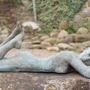 Siesta Bronze Resin with verdigris patina Garden Sculpture by Christine Baxter