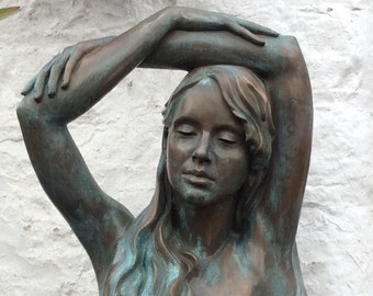 Kiara Garden Sculpture by Christine Baxter. Bronze resin. Verdigris patina. Female portrait.