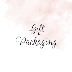 May include: A watercolor background with the text "Gift Packaging" in black cursive font.