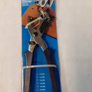 Revolving punch pliers.