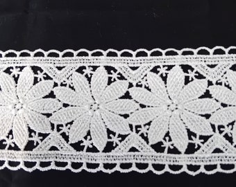 Guipure lace. Lemon and white floral pattern.
