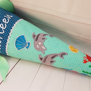 352 - Cono escolar, cono de caramelo, primer día de clases, turquesa, menta, gasolina, delfines, bajo el agua, criaturas marinas