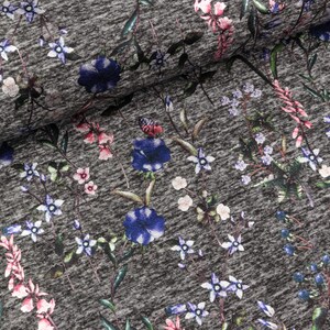 Jersey foil print flowers grey-purple on dark grey mottled (13,90 EUR / meter)