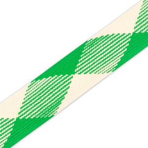 May include: Green and white checkered ribbon with a diamond pattern.