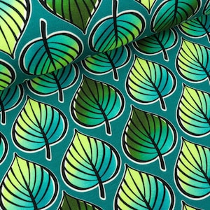 Peut inclure: Tissu turquoise avec un motif répété de feuilles vertes et jaunes. Les feuilles sont soulignées de noir et ont un effet dégradé.