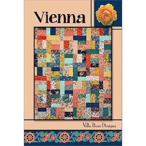 May include: A quilt pattern called "Vienna" by Villa Rosa Designs. The pattern features a colorful patchwork design with a variety of floral prints in shades of red, blue, yellow, green, and pink.