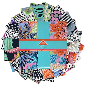 May include: A collection of 12 fat quarter fabric squares featuring a variety of colorful patterns, including floral, geometric, and abstract designs. The fabric squares are arranged in a circle around a white card with the text "Karen  Missett Collection" printed on it.