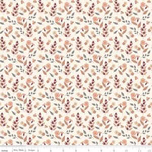 May include: A repeating pattern of stylized flowers and leaves in shades of peach, brown, and gray on a cream background. The design features various floral elements, including small clusters and larger blooms, creating a cohesive and decorative textile pattern.