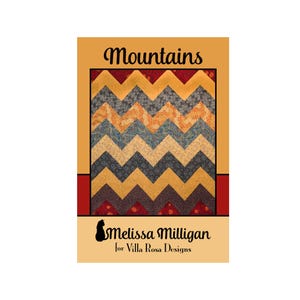 May include: A quilt pattern design titled "Mountains" by Melissa Milligan for Villa Rosa Designs. The pattern features a chevron design in shades of red, orange, yellow, gray, and blue.