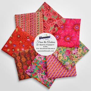May include: A collection of eight fat quarter fabric bundles with vibrant floral and patterned designs in shades of red, pink, orange, and green. The fabric bundle is from the archives by Kaffe Fassett.