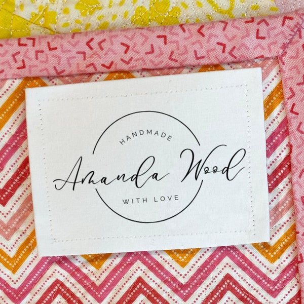 Designer quilt labels beautifully printed on your choice of cotton or polyester in sew-on form. Personalized for you