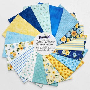 May include: A collection of sixteen fat quarter fabric pieces in various shades of blue, yellow, and white. The fabrics feature floral, striped, and dotted patterns. The bundle is labeled "Gentle Meadow" by Lola Molina.