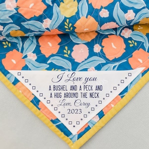 Corner Quilt Labels personalized for you on cotton fabric in sew on and measuring approximately 5 x 5&quot;
