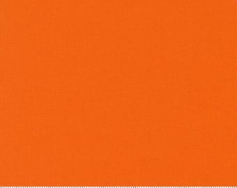 Bella Solids Quilt Fabric Orange 9900 80 by Moda Fabrics. Sold in 1/2 yard increments