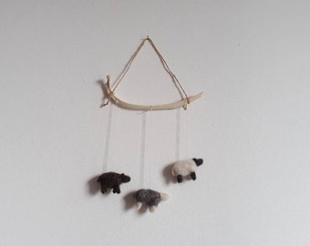 Sheep Mobile. Woolly sheep hanging from a real sheep rib