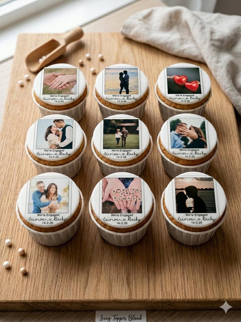 May include: Nine cupcakes with edible photo toppers arranged on a wooden board. Each cupcake has a different engagement photo and the text "We're Engaged" with a date and names. The cupcakes are in white paper liners.