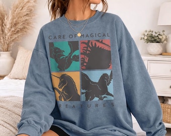 Harry Potter Care Of Magical Creatures Officially Licensed Adult Oversized Comfort Colors T-Shirt and Crewneck Sweatshirts