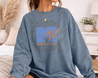 MTV 1981 Globe Officially Licensed Adult Oversized Comfort Colors T-Shirt and Crewneck Sweatshirts