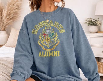 Harry Potter Hogwarts Alumni Crest Officially Licensed Adult Oversized Comfort Colors T-Shirt and Crewneck Sweatshirts