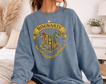 Camiseta y sudadera de cuello redondo de talla grande para adulto con licencia oficial de Harry Potter y Hogwarts.