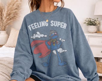 Sesame Street Super Grover Officially Licensed Adult Oversized Comfort Colors T-Shirt and Crewneck Sweatshirts