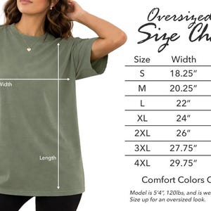 May include: An olive green oversized t-shirt with a crew neck. The image includes a size chart with measurements in inches for sizes S through 4XL. The shirt is Comfort Colors C1717.