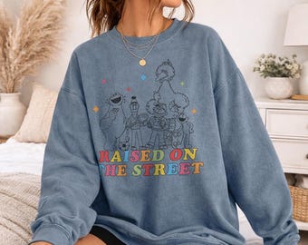 Sesame Street Raised Officially Licensed Adult Oversized Comfort Colors T-Shirt and Crewneck Sweatshirts