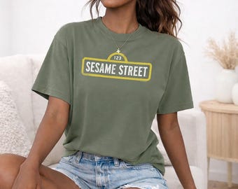 Sesame Street Rough Logo Officially Licensed Adult Oversized Comfort Colors T-Shirt and Crewneck Sweatshirts