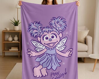Manta SilkyTouch con licencia oficial de Simple Abby de Barrio Sésamo, 36 x 58 pulgadas.
