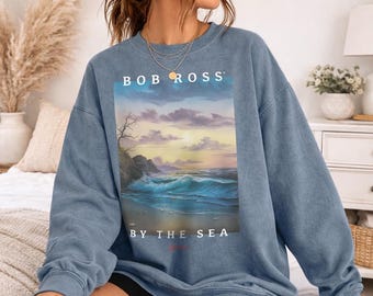 Bob Ross By The Sea Officially Licensed Comfort Colors Sweatshirt & Tee
