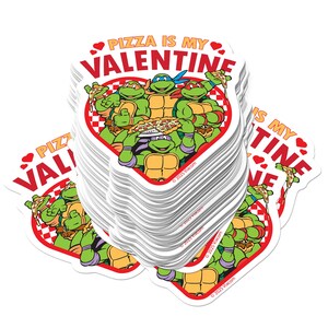 May include: A stack of heart-shaped stickers featuring the Teenage Mutant Ninja Turtles. The stickers have a red border and the text "Pizza is my Valentine." The turtles are holding pizza. Copyright 2023 Viacom.