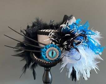 Mini sombrero de copa, mini sombrero de copa del Gato de Cheshire, Alicia en el país de las maravillas, sombrero para fiesta de té, sombrero de ojo de gato, sombrero de gato azul, sombrero de sombrerero loco