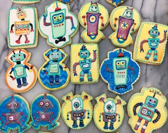 Galletas decoradas: robots espaciales  Postreadicción: Cursos de  pastelería, galletas decoradas, cortadores, papel de azúcar y mucho más.