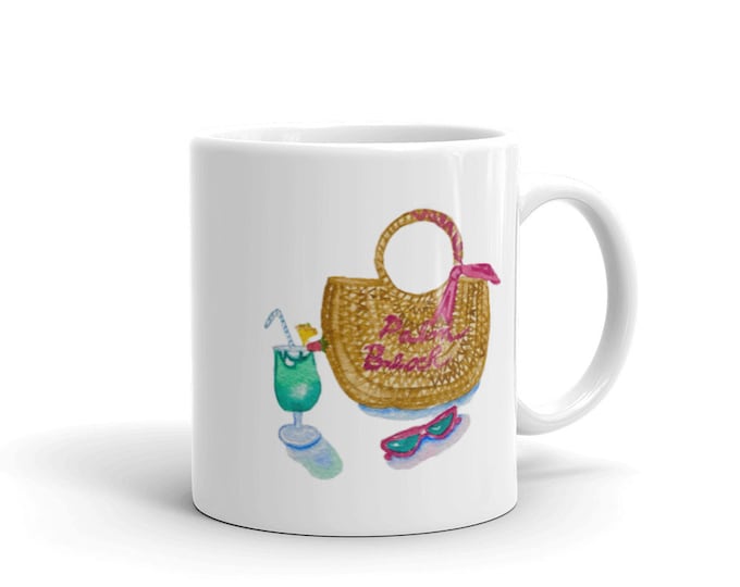 White glossy mug with pink beach bag