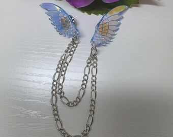 Broche de collar con pluma azul