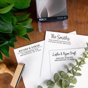 May include: Three white envelopes with black ink return address labels. The labels have the names and addresses of Ricard & Sarah, The Smiths, and Leslie & Ryan Croft.
